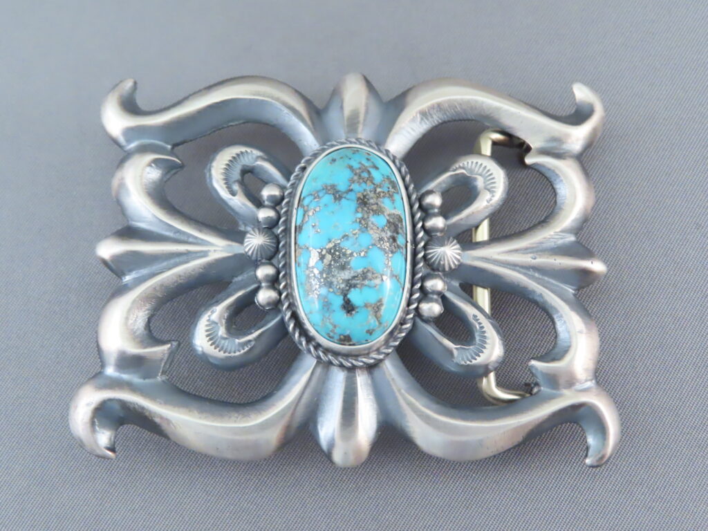 Kingman outlets Turquoise Belt Buckle.Beautiful blue stone set in a nice gold tone buckle.